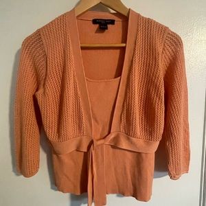 Sweater with attached wrap